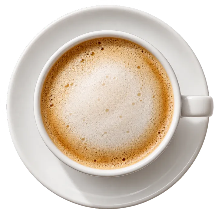 Un café crème dans une grande tasse blanche, vu de dessus